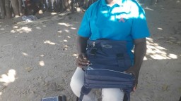 Health worker Susana sitting in her village
