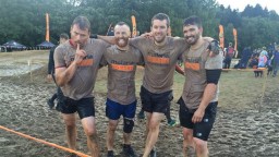 Four men covered in mud!